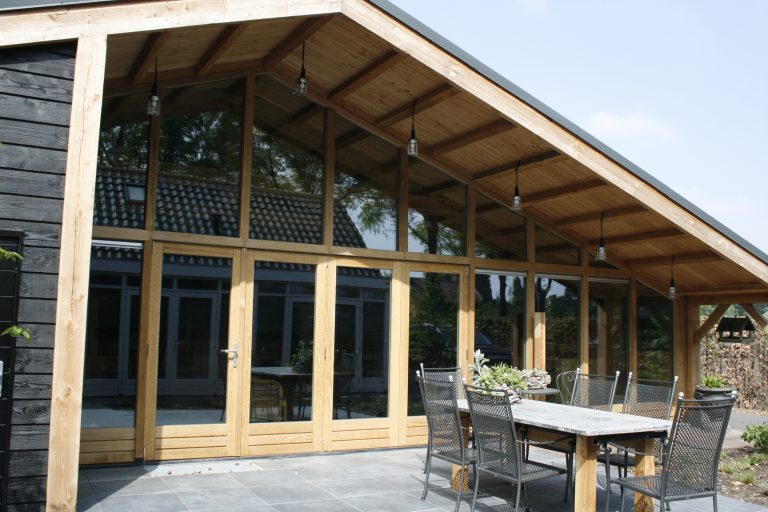 Vouwwand met loopdeur - blank hout